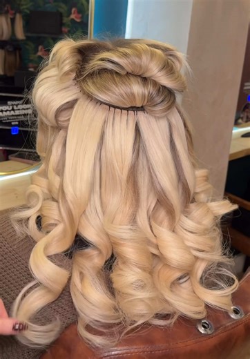 Bouncy Curly Blowout on a 22-Inch Weave