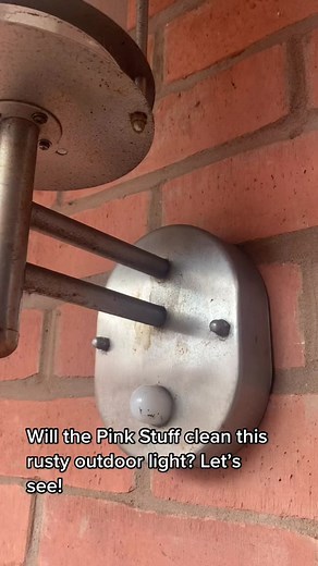 Cleaning a Rusted Outdoor Light with Pink Stuff