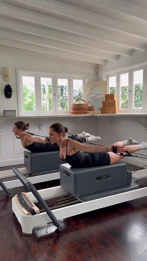 Pilates with April on Instagram: "3 Options to Layer Up Breaststroke on the Reformer 🌶️ Looking to build strength and mobility in your upper body? Try these layered variations for Breaststroke: 1 – Bicep Curl into Shoulder Press 2 – Chest Opening into Shoulder Press 3 – Arm Circles Start with the first and work your way up, or mix and match based on your strength and control. Which one is your favourite? Both wearing @leelo.active activewear & @moveactive grip socks 🖤🩶❤️ Video sped up 2x . . 