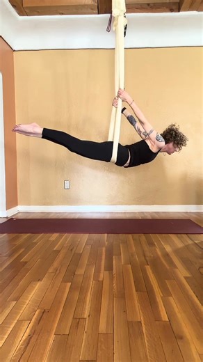 Aerial Locust Pose 曆 The hammock lifts at the hips, creating space to rise. Legs extend long, chest reaches forward, heart open and strong. Suspended here, you find strength without strain— effort that feels like flight. A balance of grounding and grace, anchored in breath, supported by silk. @StacyLewisYoga | #StacyLewisYoga #AerialYoga #LocustPose #Salabhasana #YogaInTheAir #AUMStudio | Stacy Lewis Yoga | Facebook