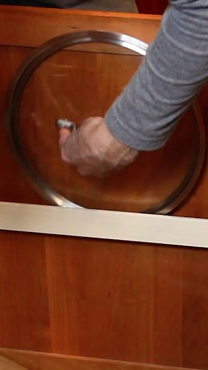 Ultimate kitchen storage hack for your pot lids! #TikTokPartner #LearnOnTikTok #minitutorials #storagehacks #lifehack