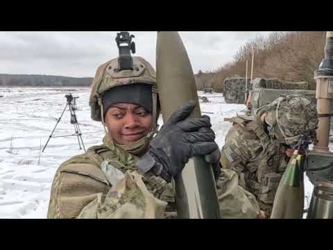 U.S. Soldiers Fire M119A3 Howitzer in Freezing Snow