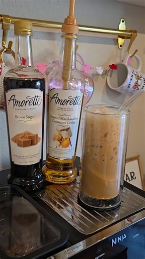 Brown Sugar Marshmallow Latte made using the Ninja Luxe Cafe ✨️ Man this brown sugar syrup is just that good! ❤️ @Amoretti- Ninja Luxe Cafe Recipe: 1 tbsp Brown Sugar syrup 1 tbsp Toasted Marshmallow Syrup Double Espresso, Supernova Beans @Superlost Coffee Milk of choice Ninja Luxe Cafe in Midnight Black @Ninja Kitchen Glass cup is from Walmart #athomebarista #ninjaluxecafe #ilovecoffee #coffeeathome #latterecipe