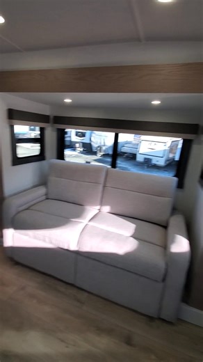 FRONT LIVING ROOM - 5 SLIDE-OUTS! - Sale Price: $84,998 - New 2026 Rockwood Signature 402SFL Fifth Wheel Length: 40' Dry Weight: ~11,700 lbs. Perfect for Travel or Your Seasonal Campsite! -6-Sided Aluminum Construction with Azdel Paneling -6-Point Automatic Leveling System -Two Power Awnings! -Slide Toppers! -Spacious front living room -Front Theater Seating and Dual Sleeper Sofas -Smart TV on Power Lift -Solar Power -Kitchen Island -Rotating Dining Table -18cuft 12-Volt Refrigerator w/ Ice Make