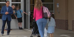 Under the new absenteeism policy, how many days of school can you miss in Iowa?