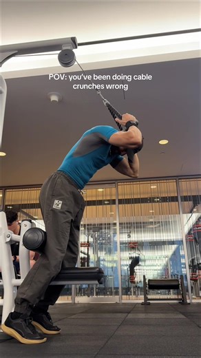 Cable Crunches, reimagined. Here’s how to do it: • Set the cable high, rope attachment. • Wedge your calves against the lat pulldown pads • Sit back slightly so your hips stay fixed • Let the weight pull you into a deep stretch • Round the spine and crunch down slowly - Programming • 3–4 sets • 8–12 slow reps • 2–4x per week - - #abs #workout #gym #sixpack #fitness