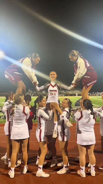 High School Cheerleader Excels on Game Day