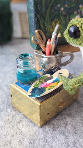 3.2M views · 220K reactions | Frog Paints a Water Lily Pond 覆 #knittedfrog #frog #painting | India Rose Crawford | Facebook