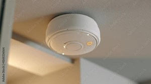 Smoke detector ceiling device with sensor for elderly fall detection safety alert system and monitoring in home environment with soft lighting