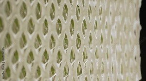 Air filter rotation close up macro in slow motion. Dust and dirt filter for air conditioning, floor duct or HEPO air cleaner. AC filter for better air quality inside home, office or car. HVAC allergy Stock Video