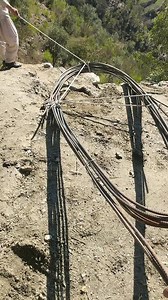Setting Up a Barbed Wire Fence in Rural Landscapes