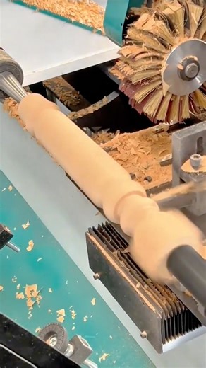 Automatic lathe shaping a wooden spindle with precision and smooth surface finish