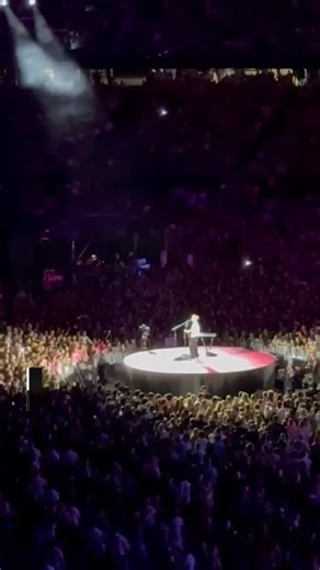 The Australian on Instagram: "It’s hard to overstate how impressive the British singer-songwriter’s ‘one man, one guitar’ approach remains, even though he’s been playing stadiums in Australia since 2015.⁣ ⁣ Toward the end of the first Australian concert of his freshly launched world tour, took a moment to thank a special subset of his audience.⁣ ⁣ “Thanks to all the parents who brought their kids to their first concert,” said the British singer-songwriter from the stage at Perth’s Optus Stadium 