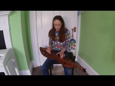 Beeswing cover on mountain dulcimer
