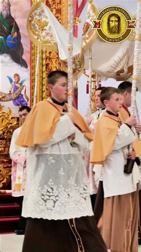 The hymn "Christus vincit" sung during the Eucharistic Procession