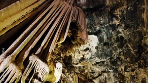 Cango caves stalactite & stalagmite archaeological limestone formations in subterranean cavern. Oudtshoorn, South Africa