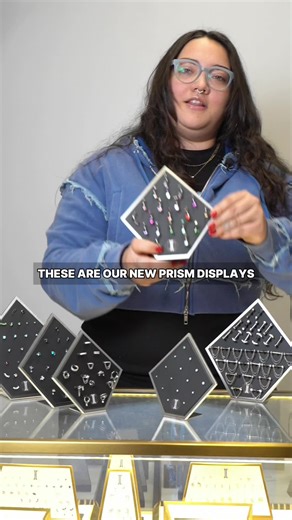 Your display isn't just storage, it's part of your artistry. Make it unforgettable. ✨ Introducing Our New Prism Displays! Designed by piercers, for piercers who are tired of jewelry sliding around, toppling over, and making client presentations feel chaotic. ✨ Precision-fit slots keep jewelry secure (no shifting, no falling) ✨ Completely interchangeable designs ✨ Catches client attention the moment they walk into your studio When your jewelry looks this organized and professional, your clients n