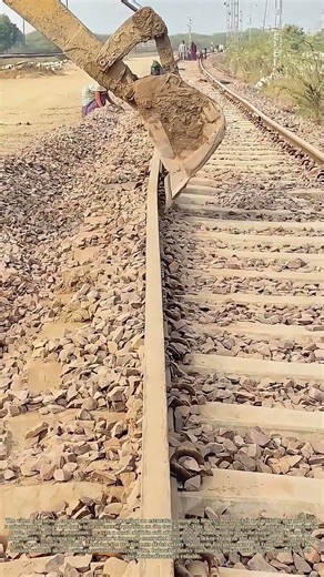 Prying a Rail Back into Line: How an Excavator Fixes Misaligned Railway Tracks