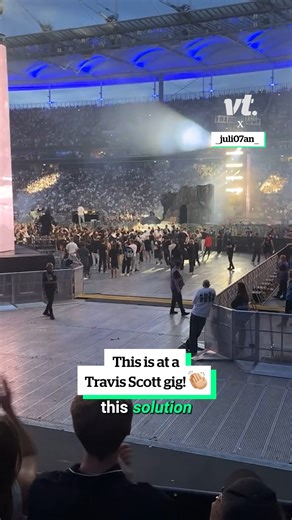 This video shows a bold move at a packed arena as someone jumps from the seated section into the floor standing area. Their goal is clear: to get closer to the action, join the dancing crowd, and be part of the mosh pit energy. Security rushes to stop them, but they narrowly slip through and disappear among the fans. The crowd reacts instantly, phones raised, capturing the daring move. The clip highlights the pull of the floor section, where the music, movement, and energy are at their peak. It’