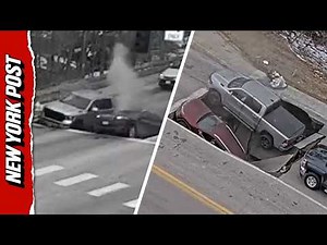 Scary Moment Cars Swallowed by Sinkhole in Omaha