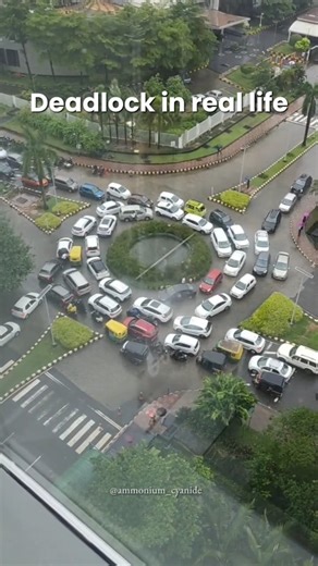 Badmosi Here🌝👽🛸 on Instagram: "When life imitates computer science: Deadlock in action ⚡️🤯 Deadlock happens when multiple processes wait on each other forever — and nobody moves ahead. In real life? It looks just like this 🤯. A perfect example of ‘you first… no, you first…’ 🚦🔄 video captured by : @kenny_wilson . . . . #Deadlock #computerscience #ProgrammingHumor #TechLife #CodingMeme #SoftwareEngineering #trending #explore #explorepage #science #physics #chemistry #fyp #trendingmemes #ins