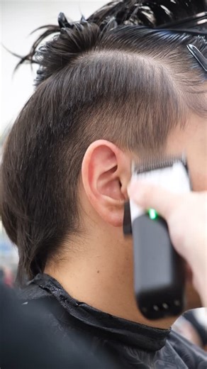 David | Two Block Haircut ✂️ on Instagram: "The two-block hairstyle is a trendy haircut originating from South Korea, widely popularized by K-pop idols and actors. It features a sharp contrast between the shorter, trimmed sides and back (lower block) and the longer, styled top (upper block), allowing for versatile looks such as straight, wavy, or voluminous hair. Emerging in the late 2000s, it became a symbol of modernity and youthfulness, gaining global appeal with the rise of K-pop and Korean 