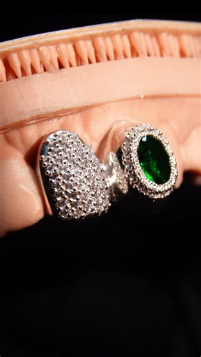 Grillz Culture | Green with envy? Nah, just iced out in ruby and emerald for @loveeat_bar 💚✨ Custom drip on the way... who's ready to see these shine in... | Instagram