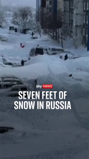Vehicles are buried in more than seven feet of snow in Russia's Kamchatka Peninsula. Two people are reported to have died in Kamchatka when a build-up of snow fell from a rooftop. #snow #vehicle #Russia | Sky News