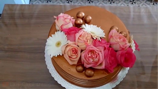 40K views · 549 reactions | Rose gold cake decorated with natural flowers  | MetDaan Cakes | Facebook