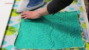 Learn the easy way to create a flawless binding with #Janome Maker Joanna Marsh from Kustom Kwilts and Designs! From how to measure your binding to the final topstitching, Joanna walks you through step by step to create stress-free binding on the Memory Craft 15000! Learn more about the Memory Craft 15000 by visiting: https://www.janome.com/machines/embroidery/qm-mc15000/ | Janome Sewing Machines