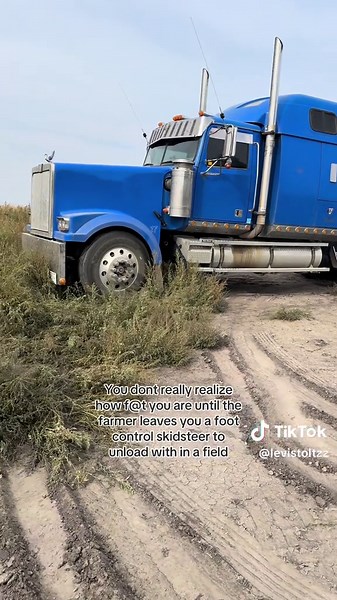 Unloading with a Foot Control Skid Steer: Farmer's Challenge