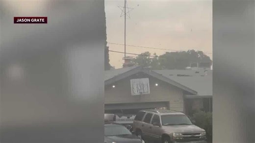 Watch: Winds snap tree branches in Carmichael, send debris down street