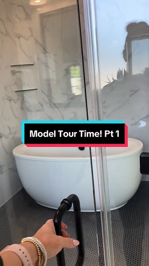 Model Home Tour Time Super Shower woth reg and rain ahower head woth a free atandinf tub places inside sureounded by seamless glass. Do we like this new trend? Tell me your thoughts! #newhomes #Texas #realestate #pulte #builder #blackandwhite #bathroom #trend #2024 #Tomball #thoughts #opinions #learning #growing #ideas #Houstons #northwest