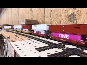 Longest HO scale double stack intermodal train on YOUTUBE.