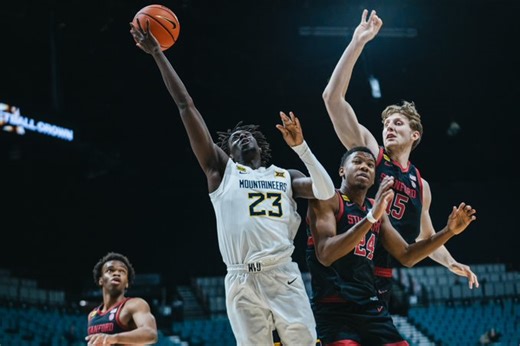 West Virginia knocks off Stanford 82-77 in overtime in the Crown
