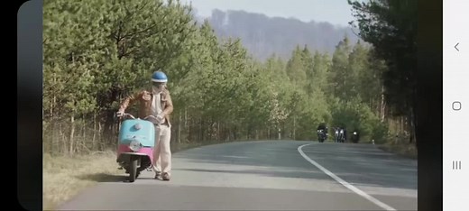 Scenic Motorcycle Ride Through Forested Roads