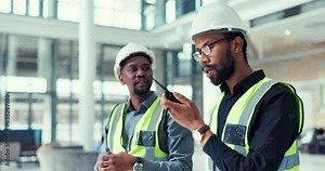 People, teamwork and engineer talking on a walkie talkie for project management and renovation. Construction, maintenance and inspection with black men or staff at office building with communication