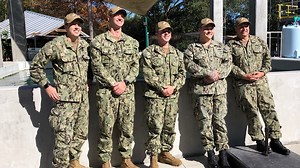 Navy sailors visit manatee they rescued from Naval Station Mayport