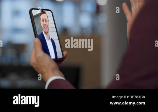 Manager speaking smartphone video chat greeting smiling man colleague close up. Unrecognizable businessman calling online to partner in office. Shoulder view manager talking client by cellphone webcam Stock Video Footage - Alamy