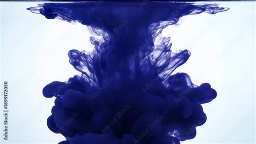Dark blue ink splashing into water, creating an abstract underwater scene with flowing tendrils, captured from a frontal viewpoint