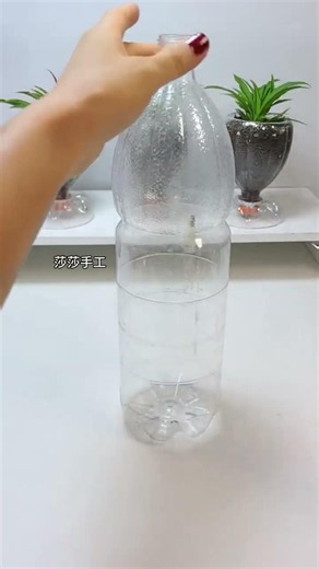 Empty beverage bottles make beautiful flower pots for the office. #KnowledgeSeedProject EmptyBottles