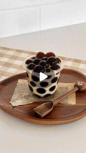 Michael Tran on Instagram: "let’s make those viral big boba drinks 🧋 well it’s actually jelly and you can use a round ice tray to make them! grass jelly recipe 90g grass jelly powder (linked under drink ingredients) 3 1/2 tbsp sugar (adjust to desire) 4 cups of water 2 round silicone ice trays Instructions 1. Bring 3 cups of water to a boil in a pot 2. Mix 1 cup water, grass jelly powder, and sugar in a small bowl 3. Once water boils, slowly pour in the mixture and keep mixing slowly as 