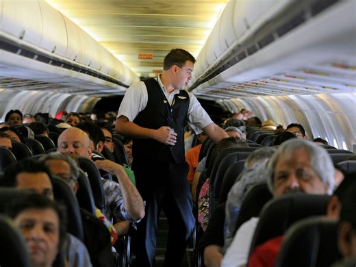 Some flight attendants at ultra-low-cost carriers make more than United crew. Here's how much they earn.