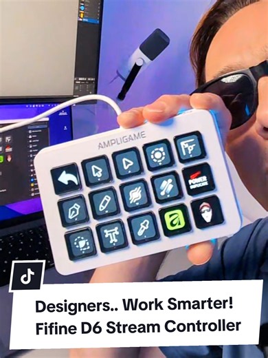 Graphic Designers! Have you seen this? The Fifine D6 Stream Controller can help you access your favourite tools, shortcuts at the touch of a button. You get 15 Programmable Buttons to instantly launch your favourite apps, setup macros, Switch scenes on streaming platforms, control your media and more. This Stream deck can also act as a soundboard which is handy if you are a Gamer who live streams. #FifineD6 #StreamController #DeskSetup #ProductivityTools #graphicdesigners @Fifine Shop