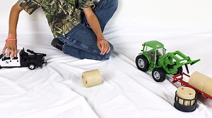 4.3K views · 32 reactions | Every farm needs a good hay baling setup. Big Country Toys has you covered with our patent pending Hay Baling Set. This set includes a tractor with movable arms and an interchangeable bucket and fork, Ford F350 Flatbed with a working hay squeeze, Flatbed Trailer, Hay Trailer, and 11 Hay Bales with holes. Add our Hay Baling Set to your toy farm today by visiting https://www.bigcountryfarmtoys.com/products/hay-baling-set | Big Country Toys | Facebook