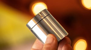 Solving the strange cylinder puzzle