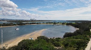 Gold Coast Marine stadium with a newly built public pontoon and mooring jetty next to surrounding park areas. Drone view