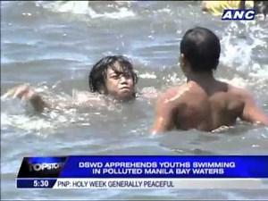 DSWD 'rescues' kids swimming in Manila Bay