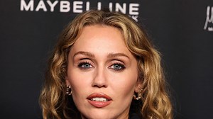 Miley Cyrus Goes Topless for a Powerful Plunging Look