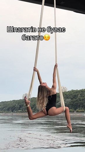 Aerial Silk Acrobatics by a Dancer in Outdoor Setting